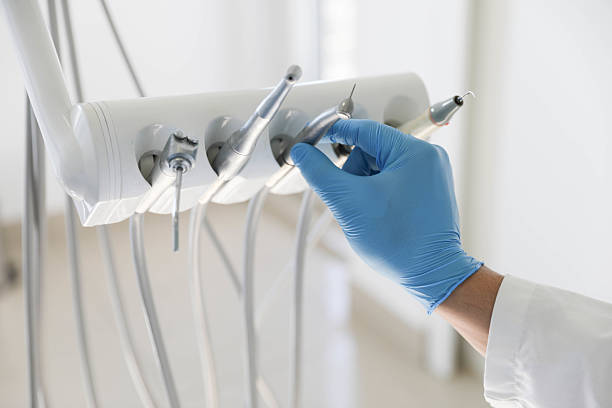 Professional Emergency Dentist technician working in Fairfax city County, VA